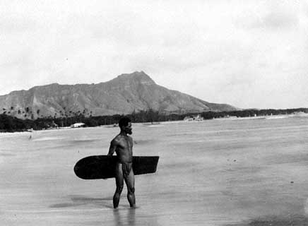 B15, By the End of the 19th Century Surfing Was its Lowest Ebb.  This Lone Hawaiian Surfer at Waikiki Beach Carries One of the Last Alaia Boards to Be Ridden There.
